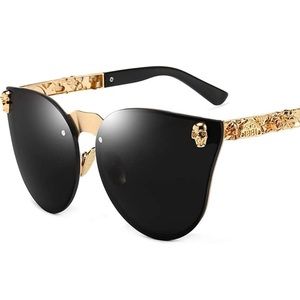 Gold and black skull sunglasses